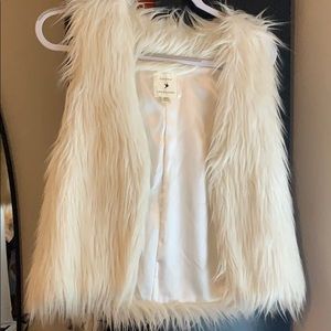 White faux fur vest